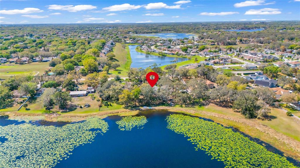 1217 Edgewood Ranch Road Orlando, FL 32835 - Photo 4 of 91 an aerial view of residential houses with outdoor space and swimming pool