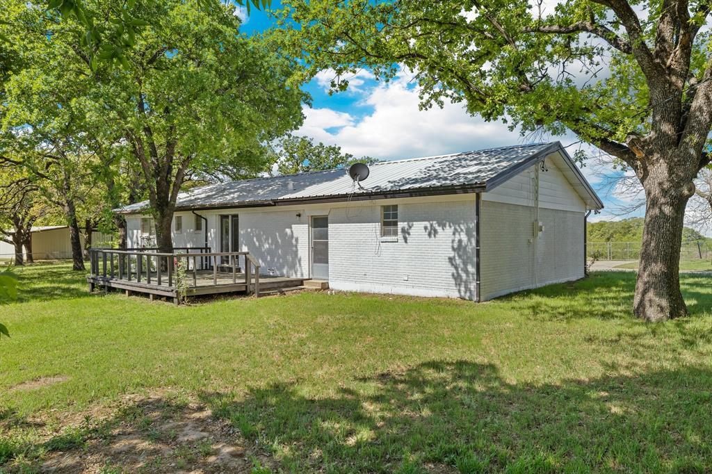 3301 South Murvil Street Decatur, TX 76234 - Photo 26 of 28 The back deck is the perfect place for tranquil morning coffee or grilling for a group!