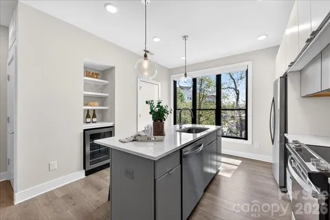 a kitchen with counter top space and appliances