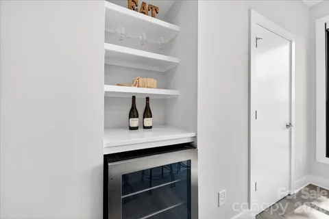 a kitchen with a sink and a window