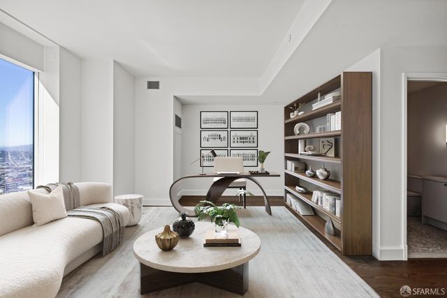 a living room with furniture and furniture