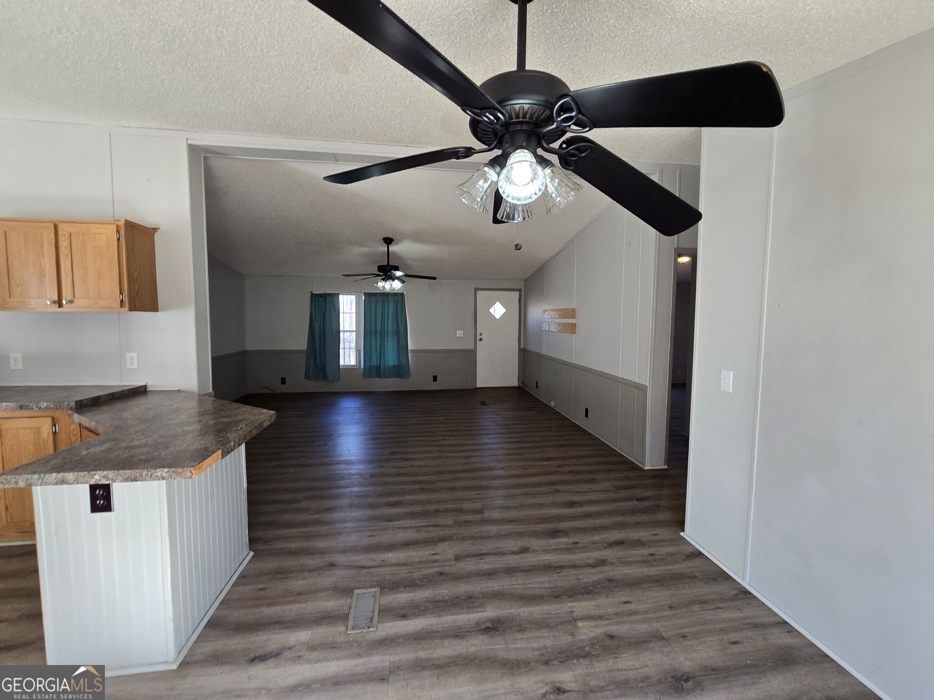 122 Puckett Road Southeast Emerson, GA 30137 - Photo 13 of 17 a view of a kitchen with a sink and wooden floor