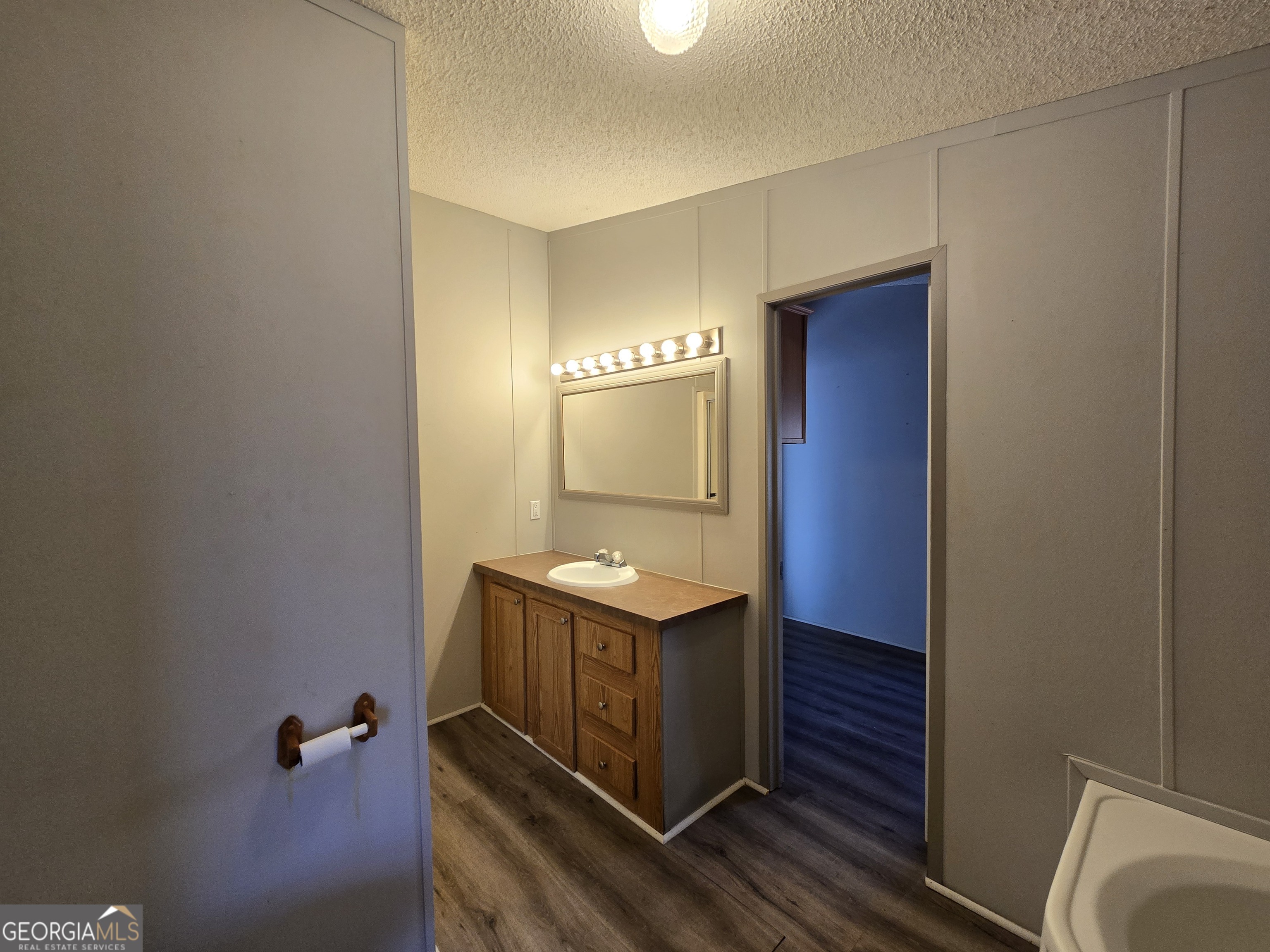 122 Puckett Road Southeast Emerson, GA 30137 - Photo 9 of 17 a bathroom with a sink and a mirror