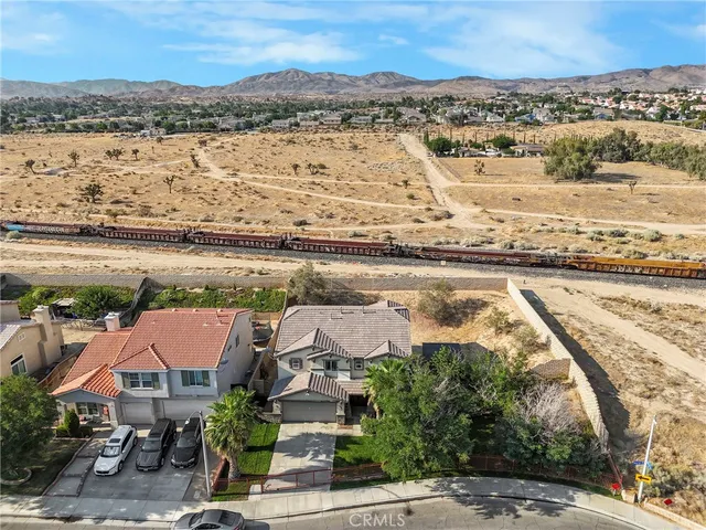 an aerial view of residential building and lake view