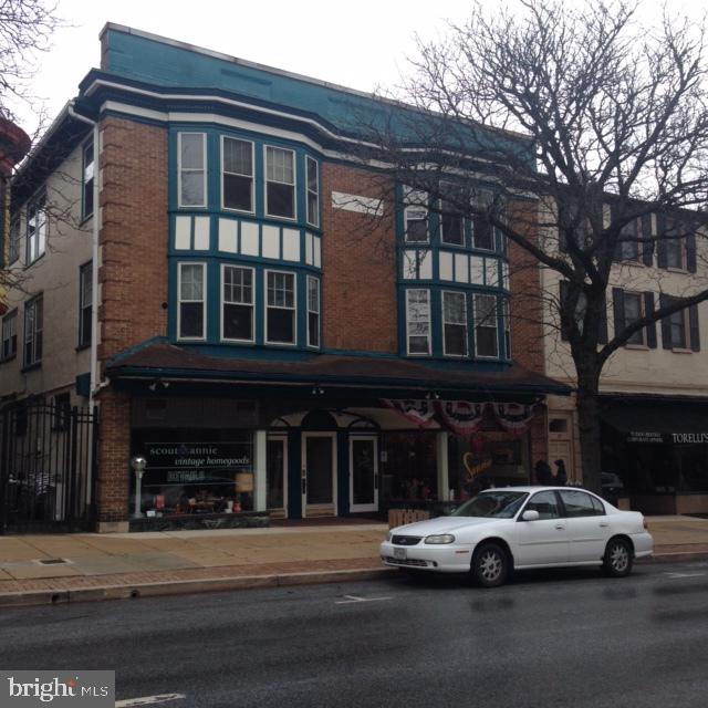 127 State Street, Unit 2 Kennett Square, PA 19348 - Photo 1 of 11 a car parked in front of a building