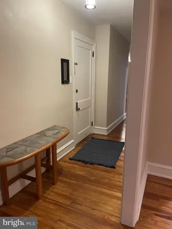 a room with a table and chairs
