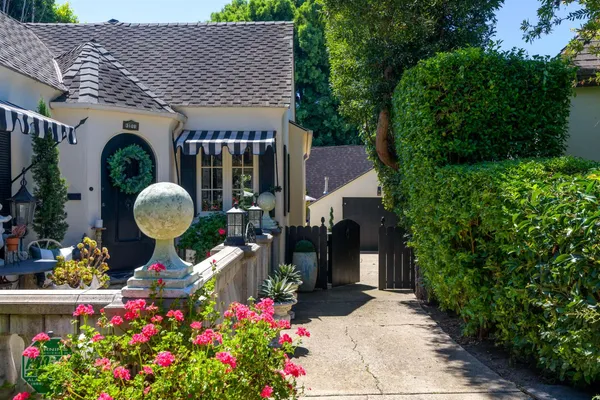 a front view of house with an outdoor space