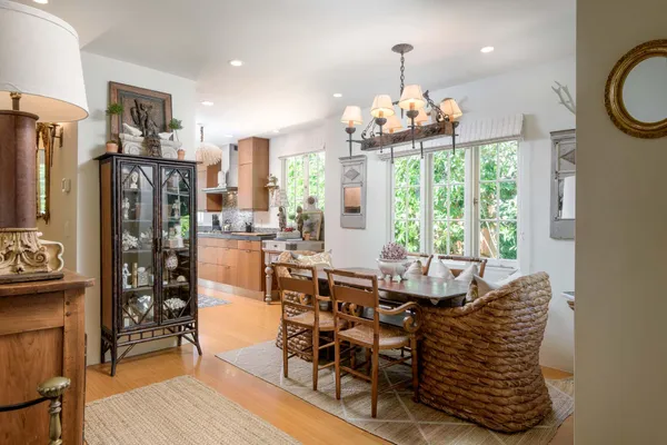 a kitchen with stainless steel appliances granite countertop a stove and a sink