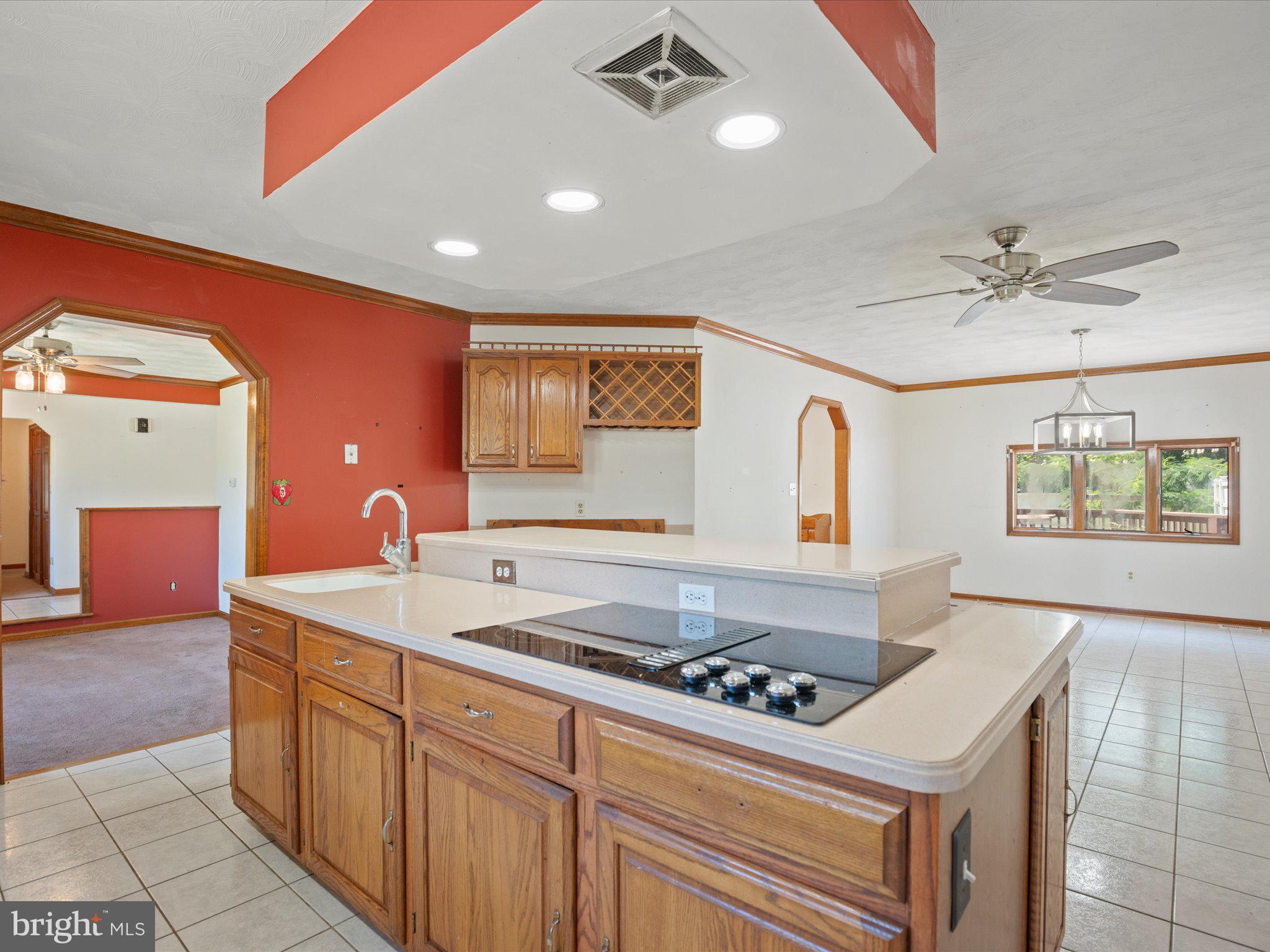 4340 Huntingtown Road Huntingtown, MD 20639 - Photo 19 of 42 a kitchen that has a sink and a stove
