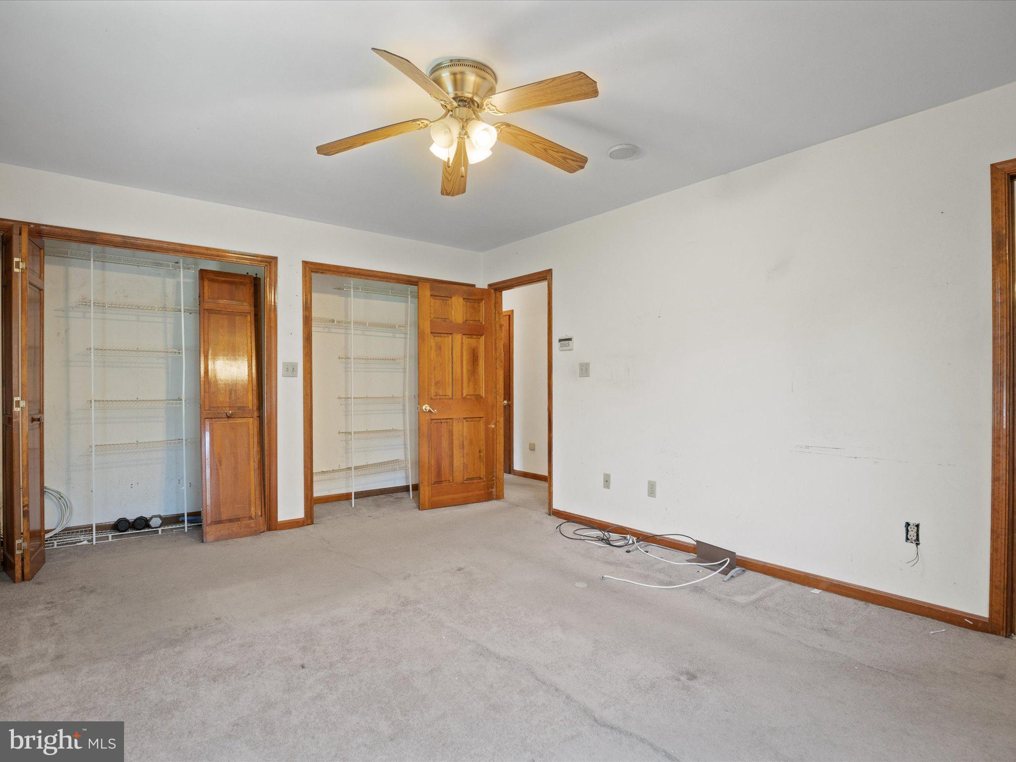 4340 Huntingtown Road Huntingtown, MD 20639 - Photo 29 of 42 an empty room with closet and entryway