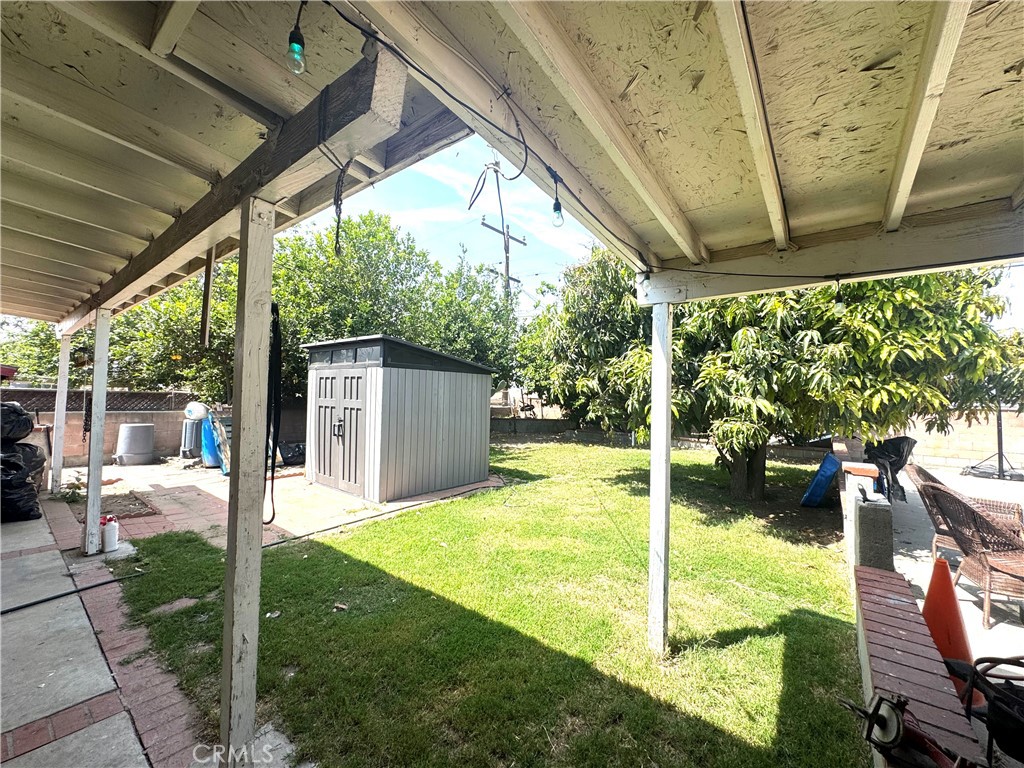 1042 North Alice Avenue Rialto, CA 92376 - Photo 23 of 31 a view of a porch with furniture and garden