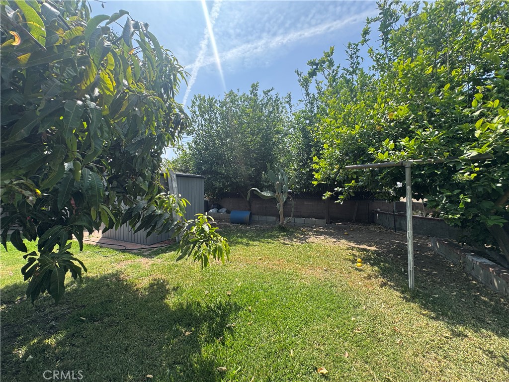 1042 North Alice Avenue Rialto, CA 92376 - Photo 25 of 31 a view of swimming pool with a yard