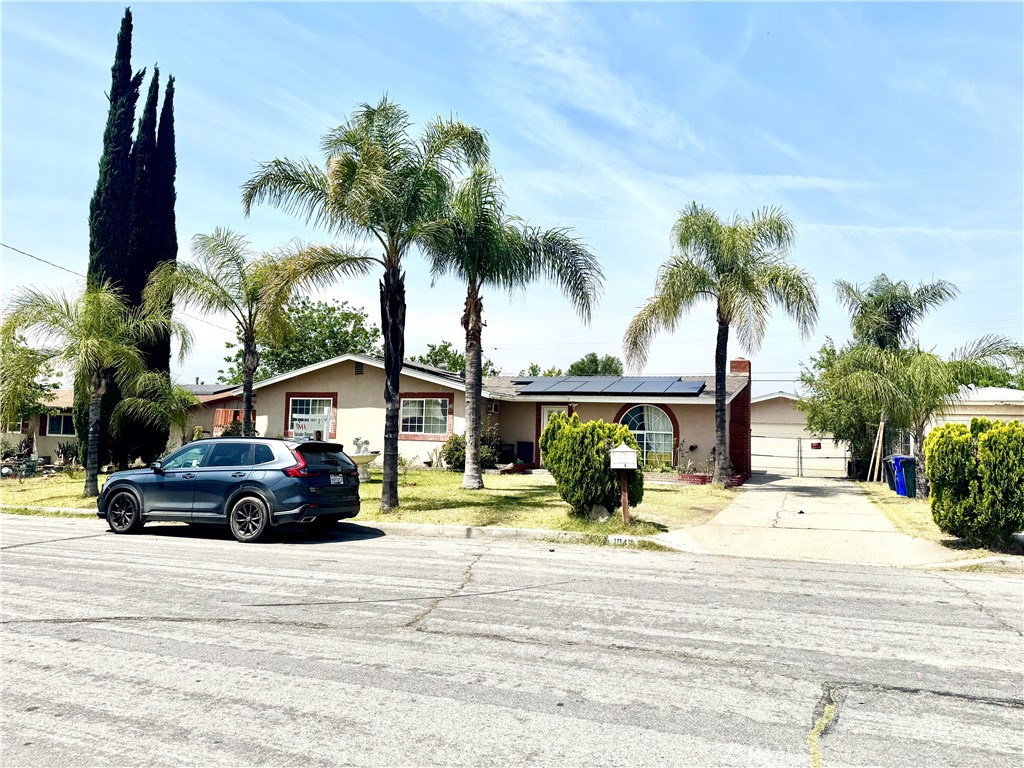 1042 North Alice Avenue Rialto, CA 92376 - Photo 3 of 31 a view of a house with a patio