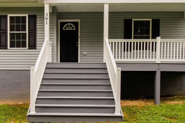a view of front door and a window