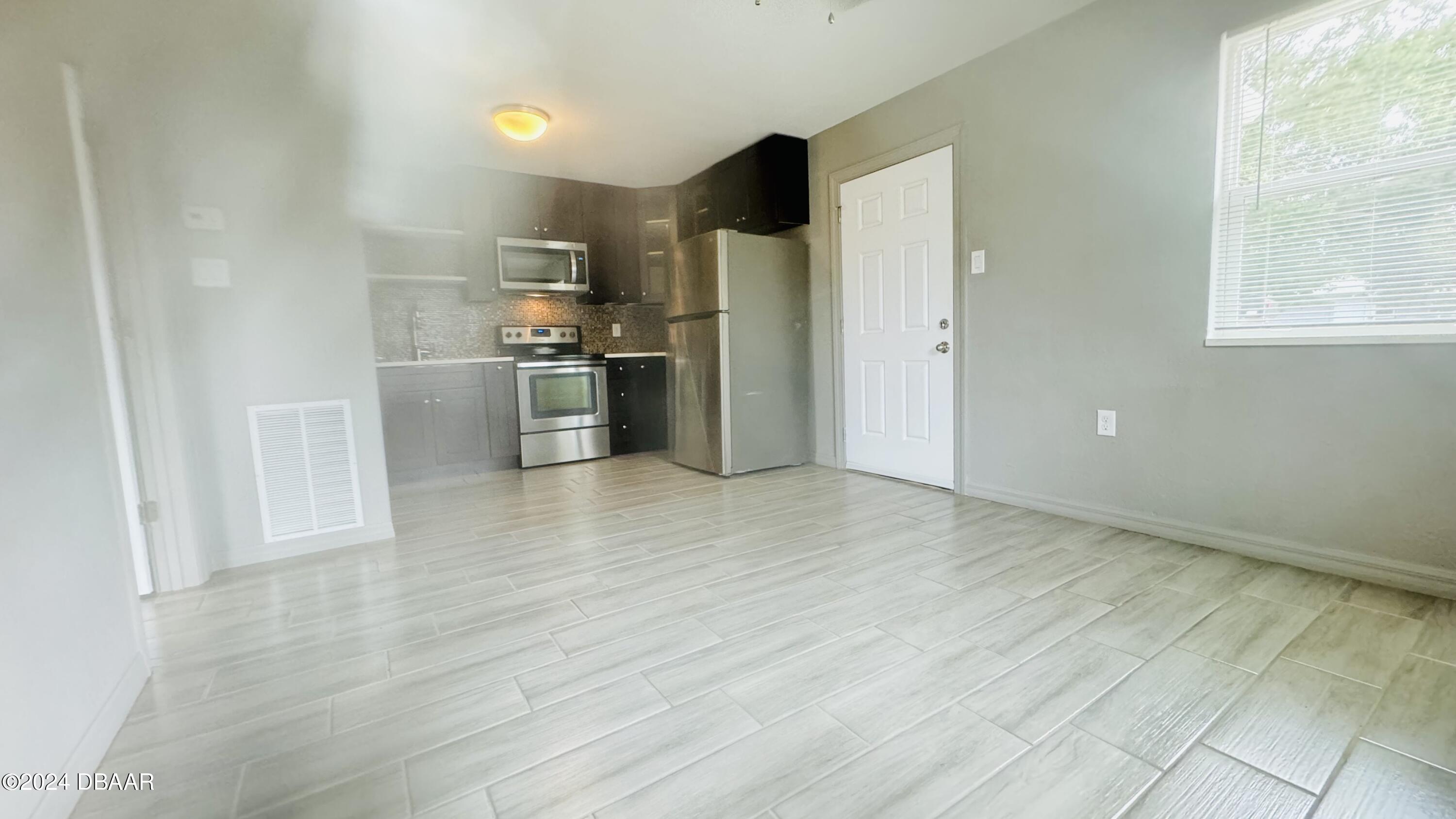 71 Rockefeller Drive, Unit A Ormond Beach, FL 32176 - Photo 11 of 21 IMG_1039