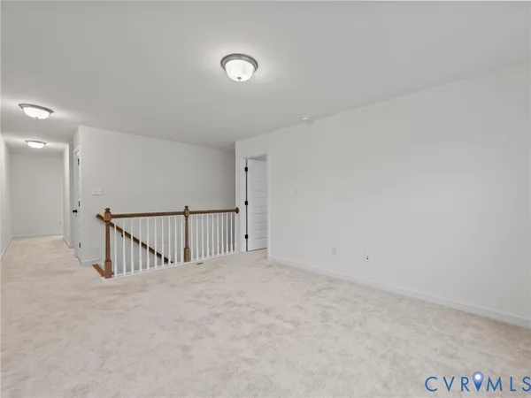 a view of staircase and white floor to ceiling window