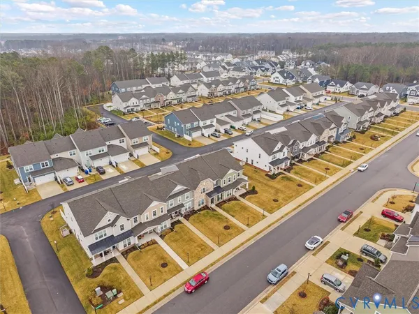 an aerial view of a city with ocean view