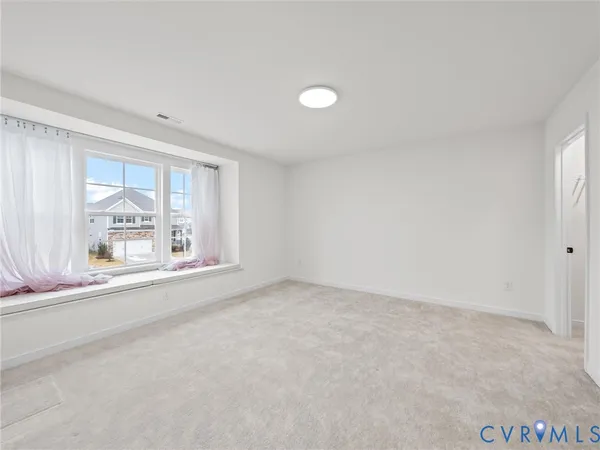 a picture of a bathroom with a shower