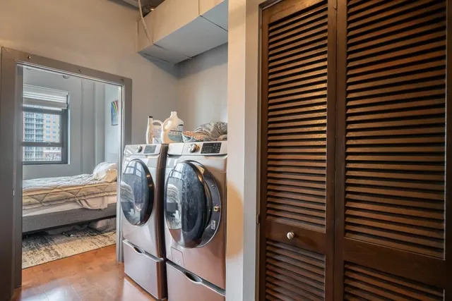 a utility room with dryer and washer