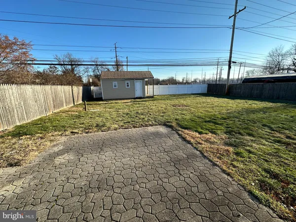 a view of a backyard of a house