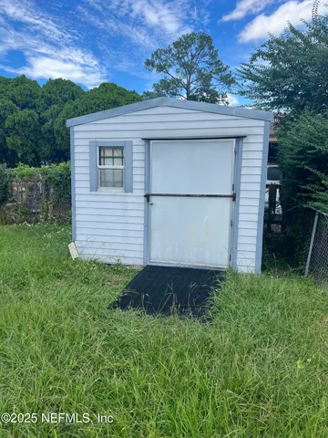 a house view with a garden space
