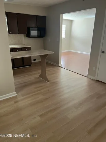 a bathroom with a sink a toilet and bathtub