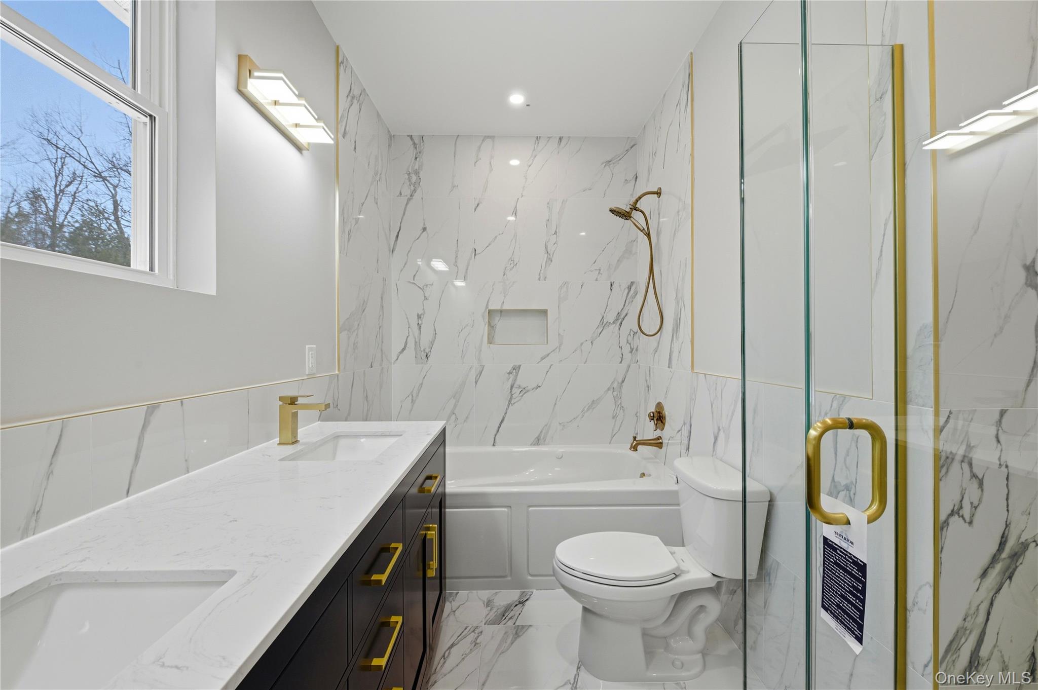 15 Manchester Road Rock Hill, NY 12775 - Photo 15 of 46 a bathroom with a granite countertop sink toilet and shower