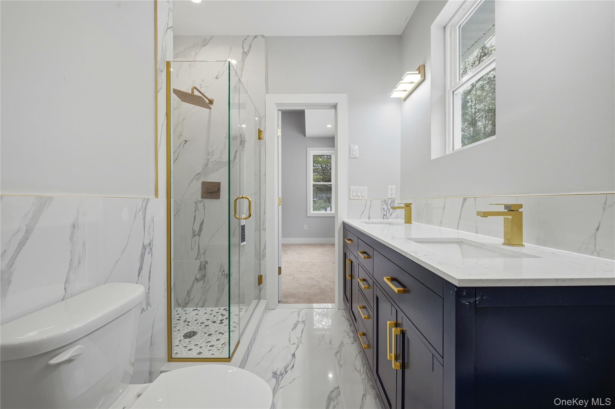 15 Manchester Road Rock Hill, NY 12775 - Photo 16 of 46 a bathroom with a sink a toilet and shower