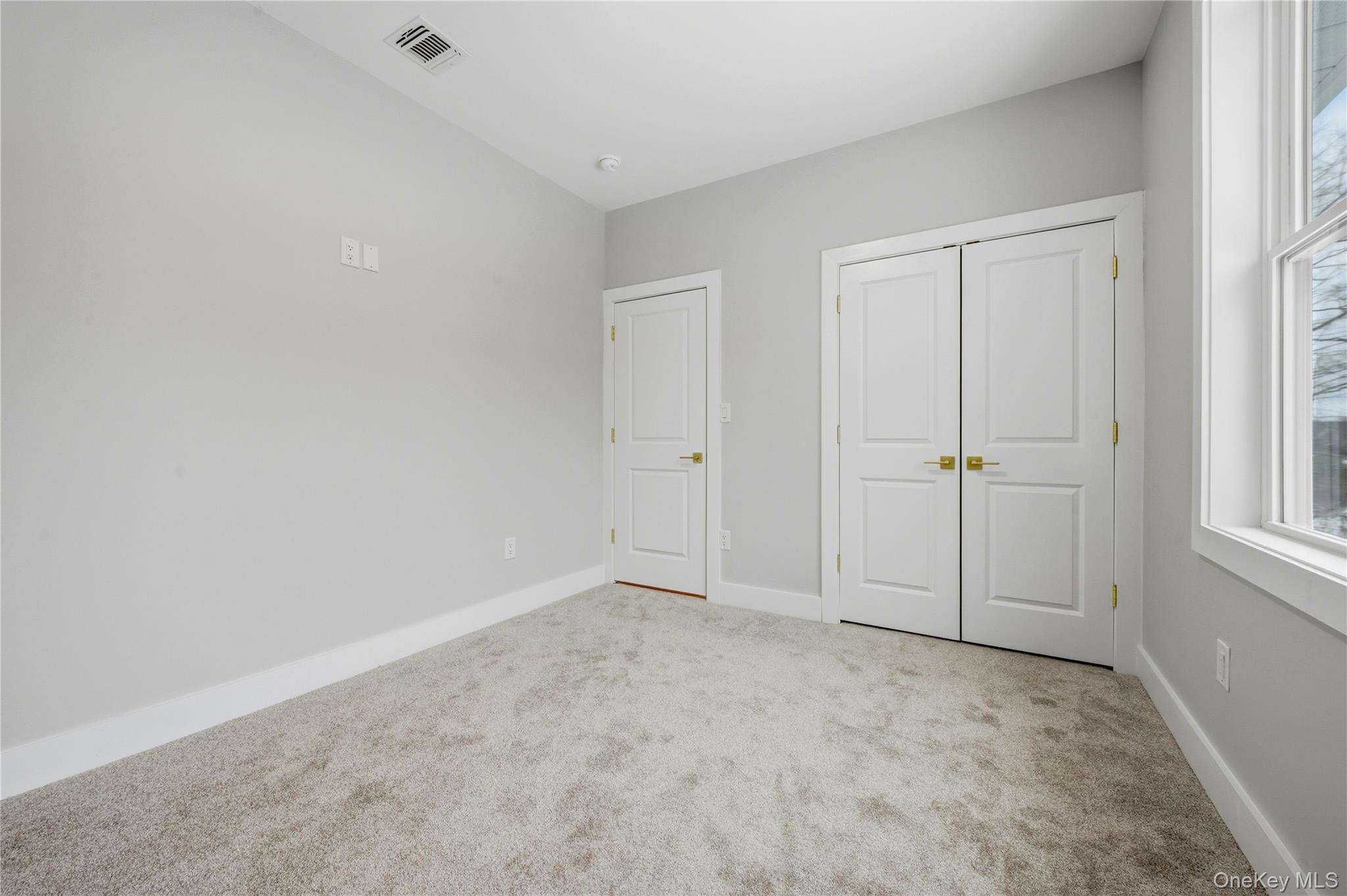 15 Manchester Road Rock Hill, NY 12775 - Photo 22 of 46 an empty room with windows