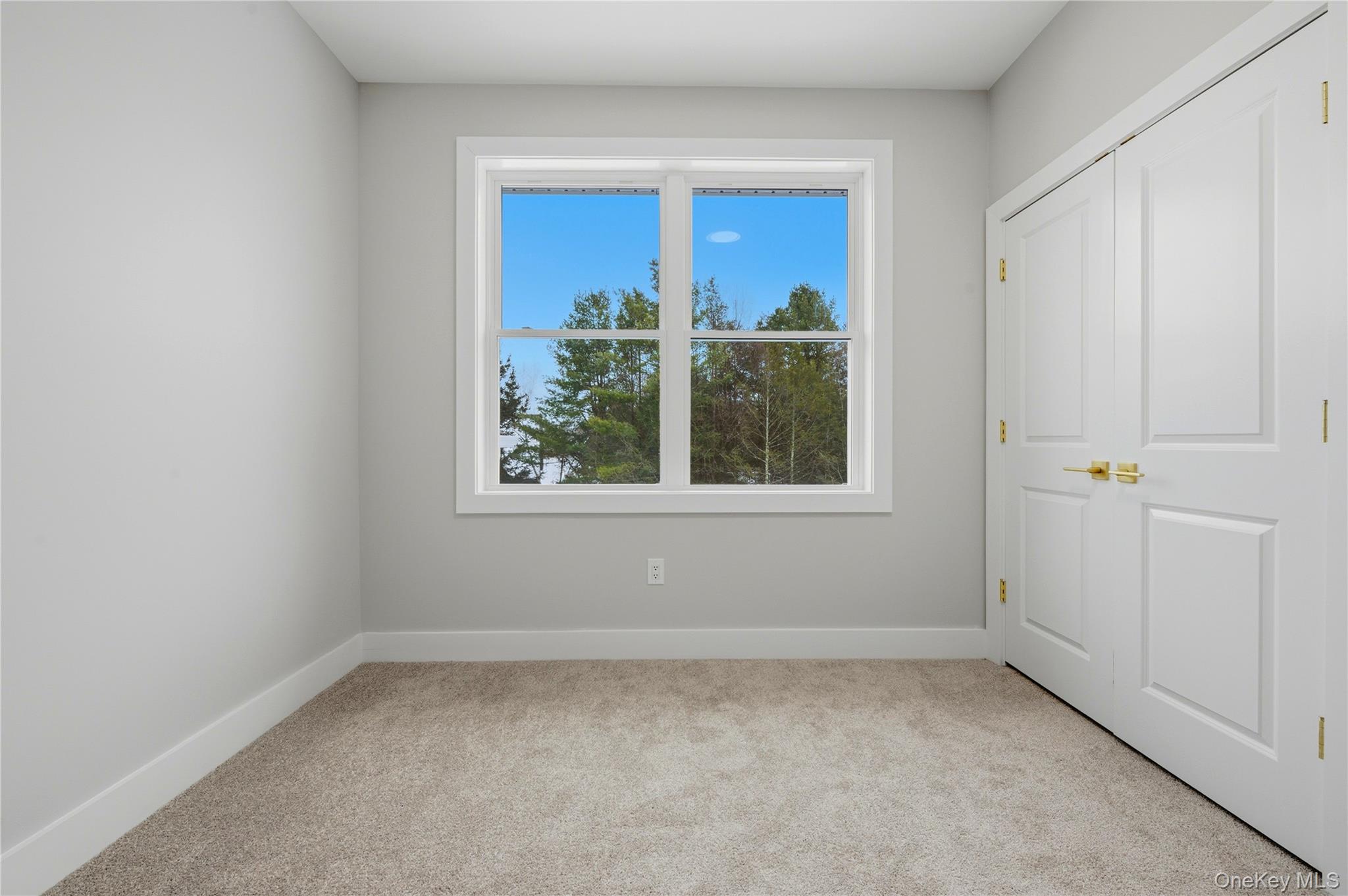 15 Manchester Road Rock Hill, NY 12775 - Photo 24 of 46 an empty room with a window