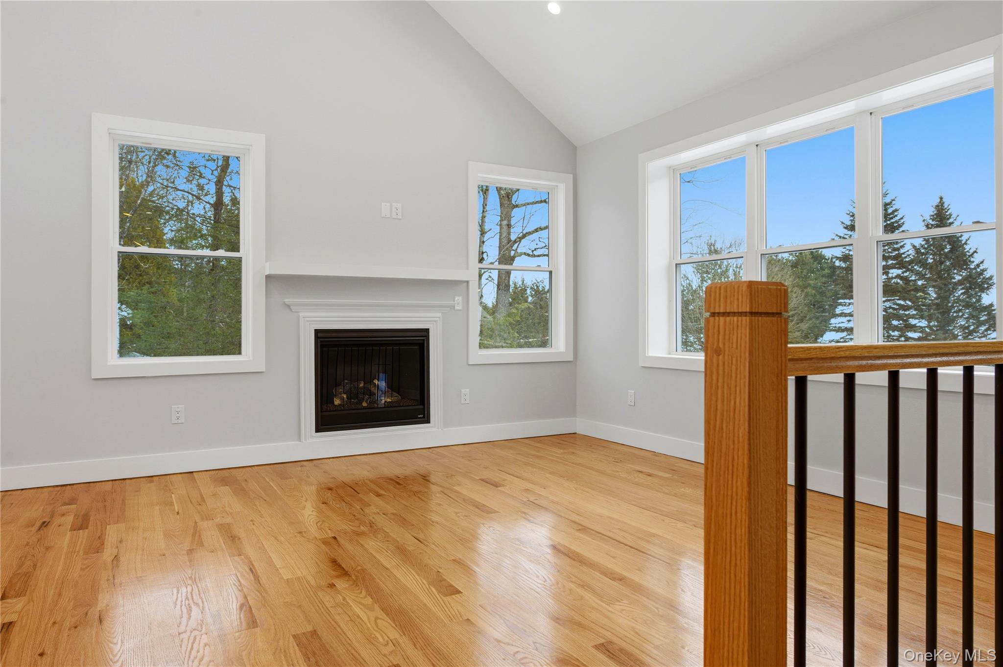 15 Manchester Road Rock Hill, NY 12775 - Photo 26 of 46 a view of an empty room with a window and wooden floor