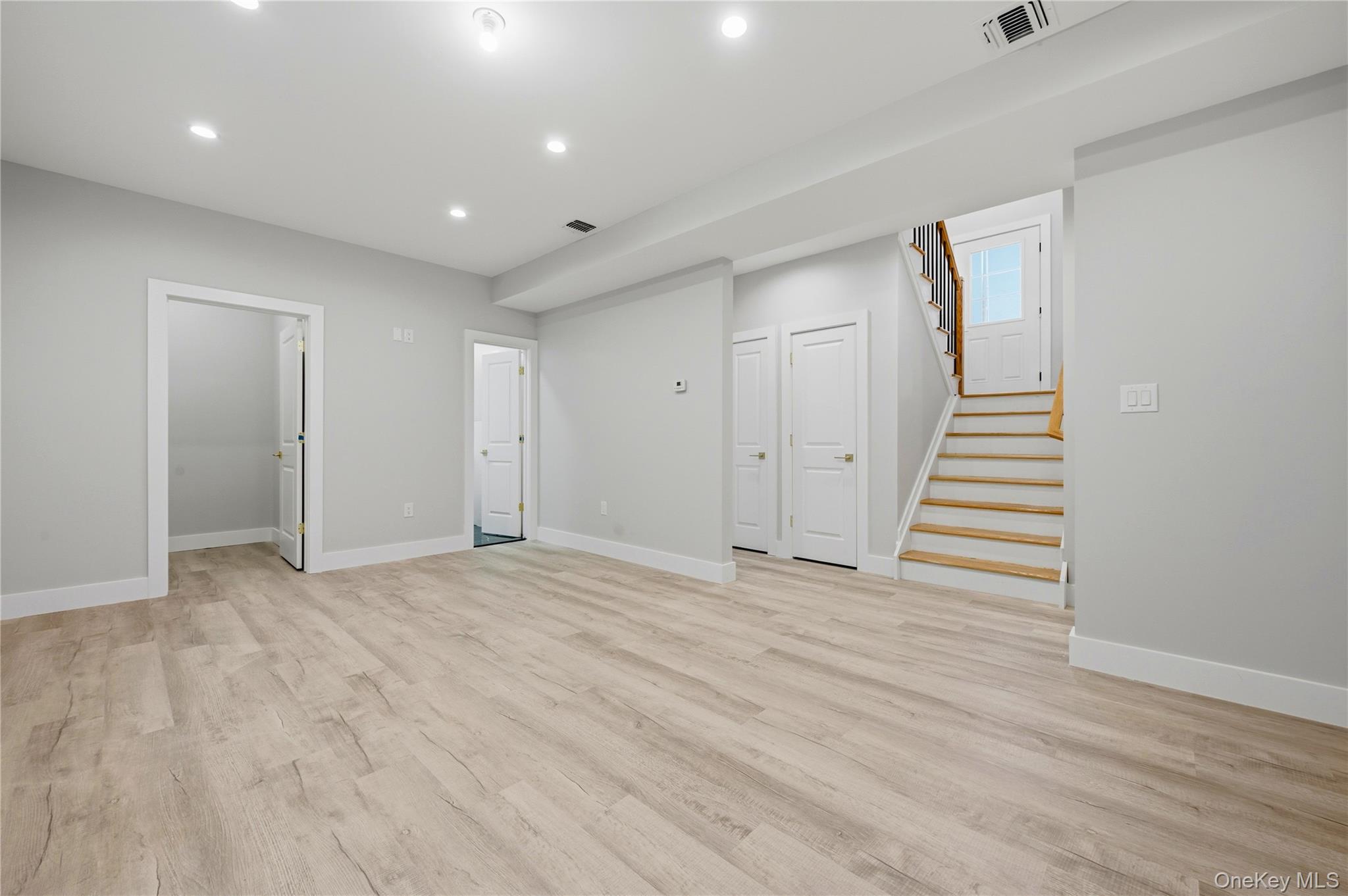 15 Manchester Road Rock Hill, NY 12775 - Photo 28 of 46 a view of an empty room with wooden floor and entryway