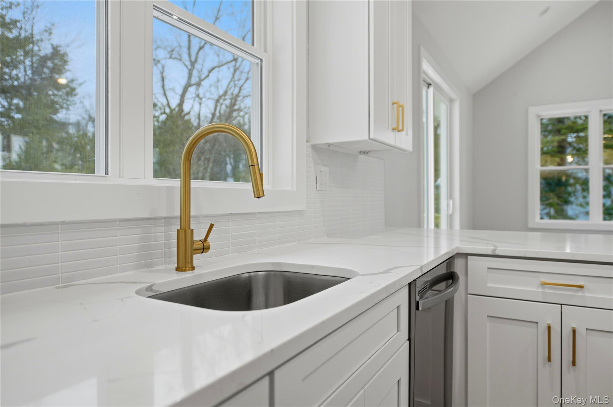 15 Manchester Road Rock Hill, NY 12775 - Photo 39 of 46 a kitchen with stainless steel appliances granite countertop a sink and a window