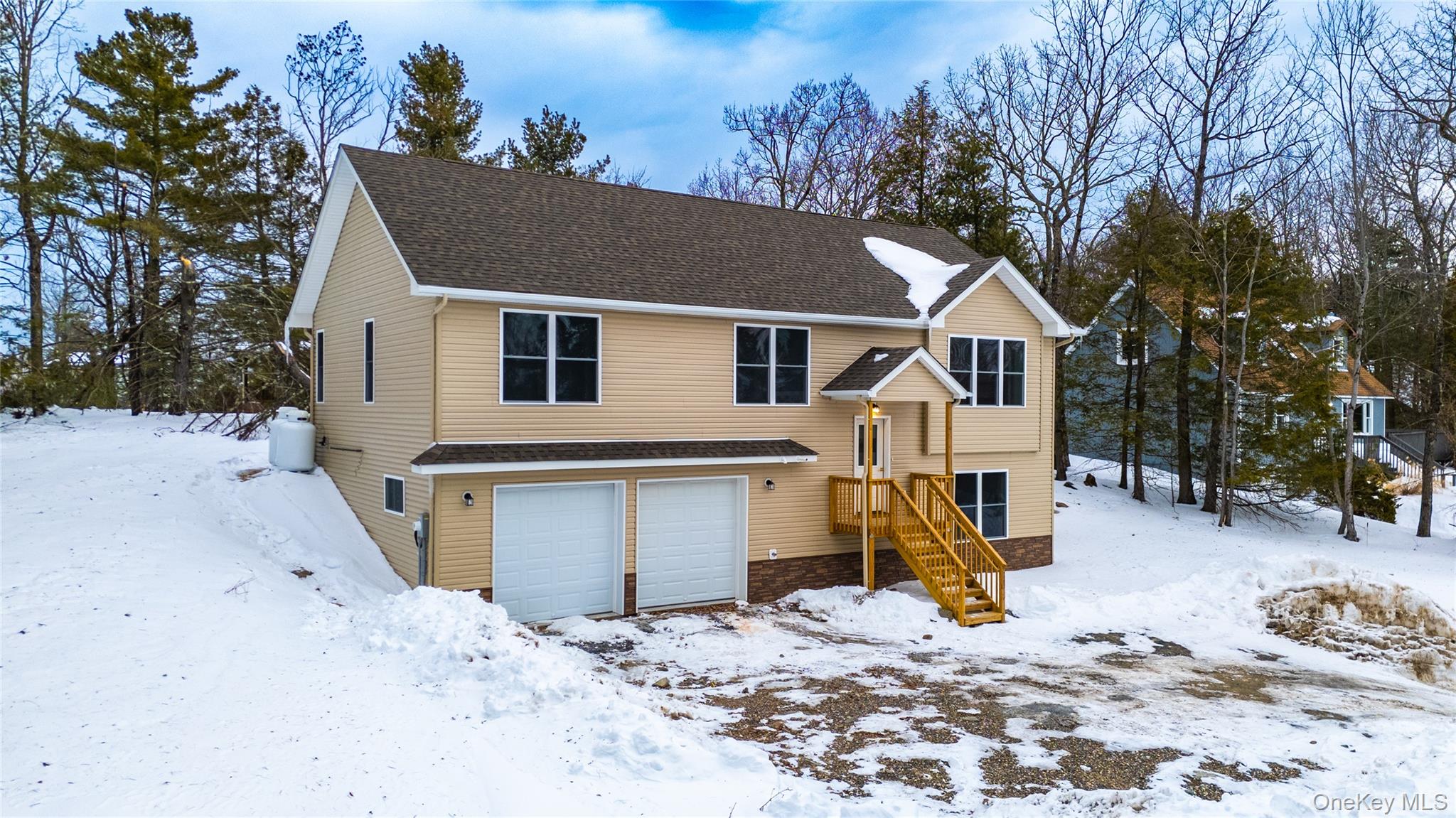 15 Manchester Road Rock Hill, NY 12775 - Photo 41 of 46 a view of a house with a snow in the background