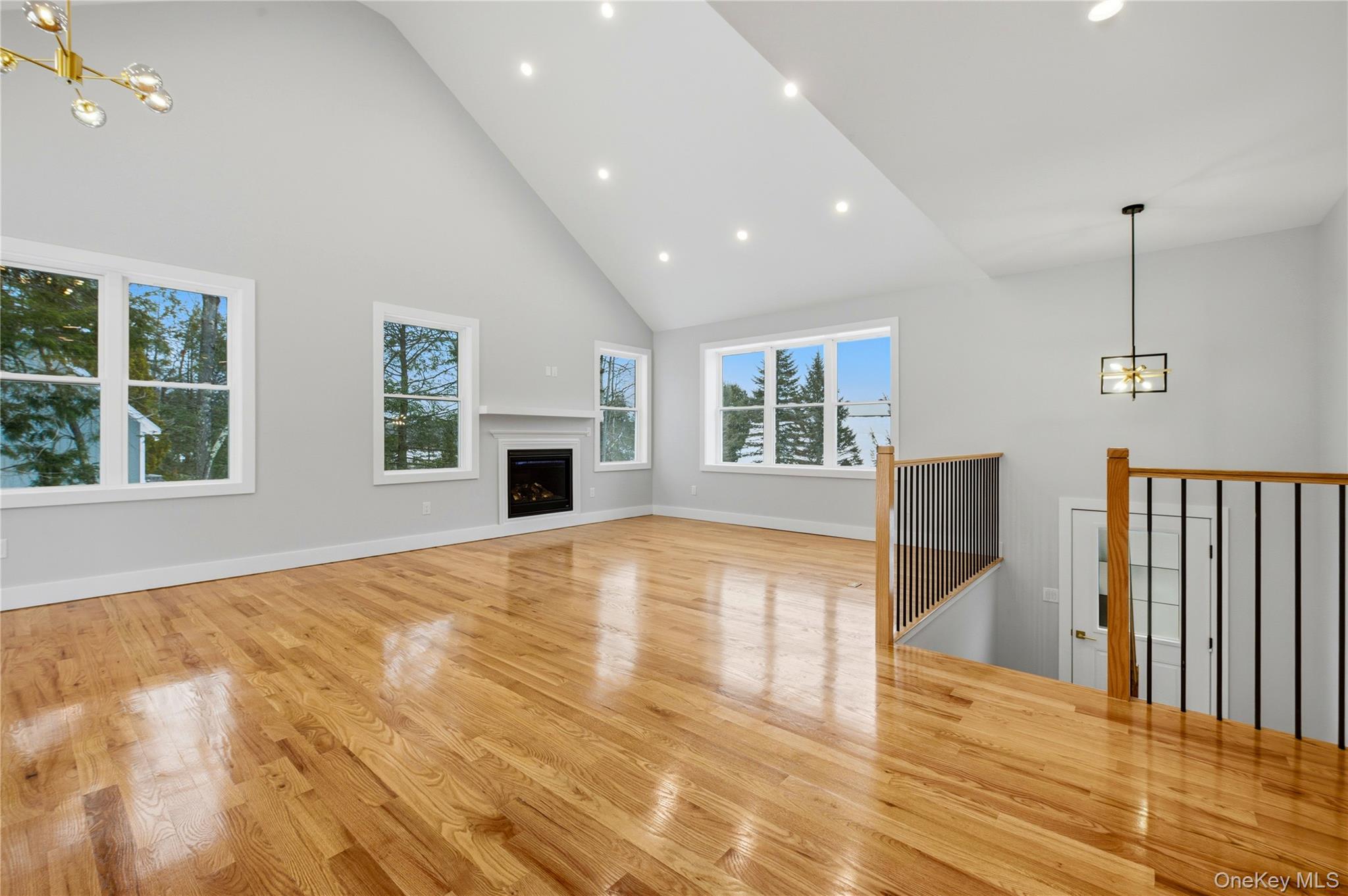 15 Manchester Road Rock Hill, NY 12775 - Photo 7 of 46 a view of empty room with wooden floor and fan