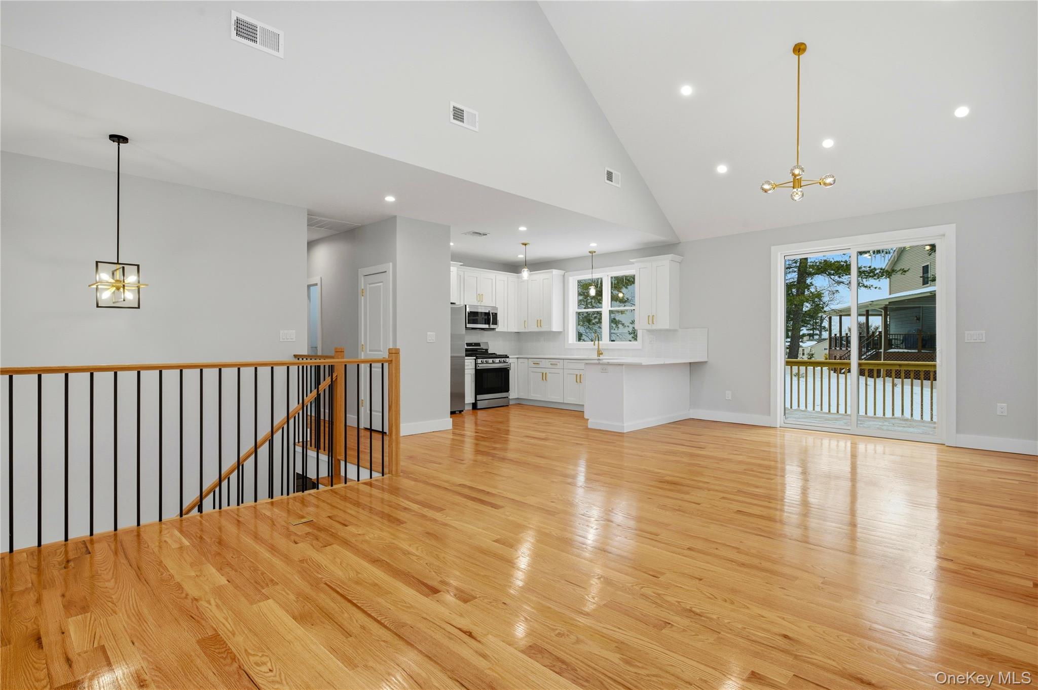 15 Manchester Road Rock Hill, NY 12775 - Photo 9 of 46 a view of a kitchen with kitchen island a counter top space a sink stainless steel appliances and cabinets