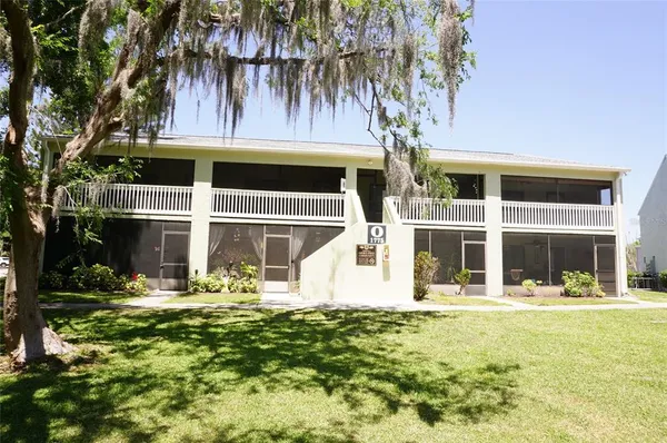 a front view of house with yard
