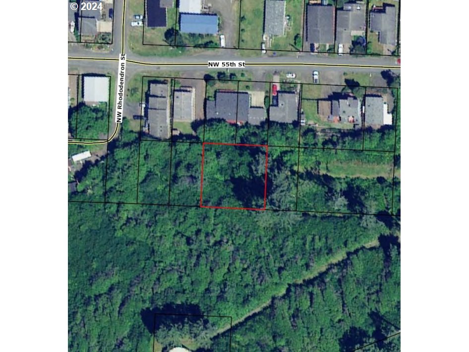 0 Northwest Rhododendron Street, Unit 9 10 11 Newport, OR 97365 - Photo 1 of 6 a view of building with outdoor space