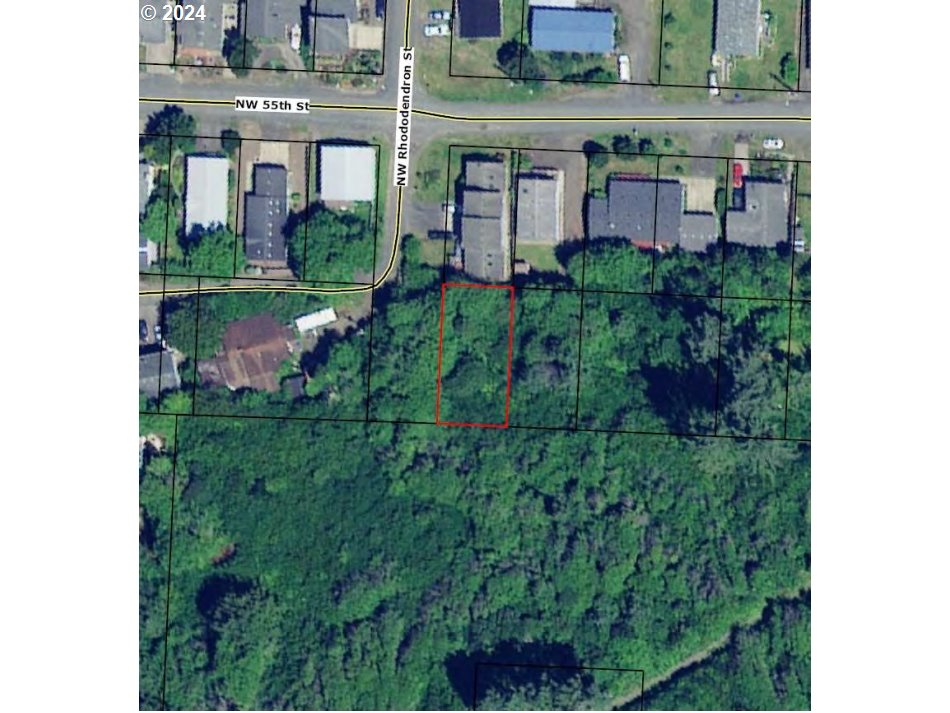 0 Northwest Rhododendron Street, Unit 9 10 11 Newport, OR 97365 - Photo 3 of 6 a view of building with a yard and plants