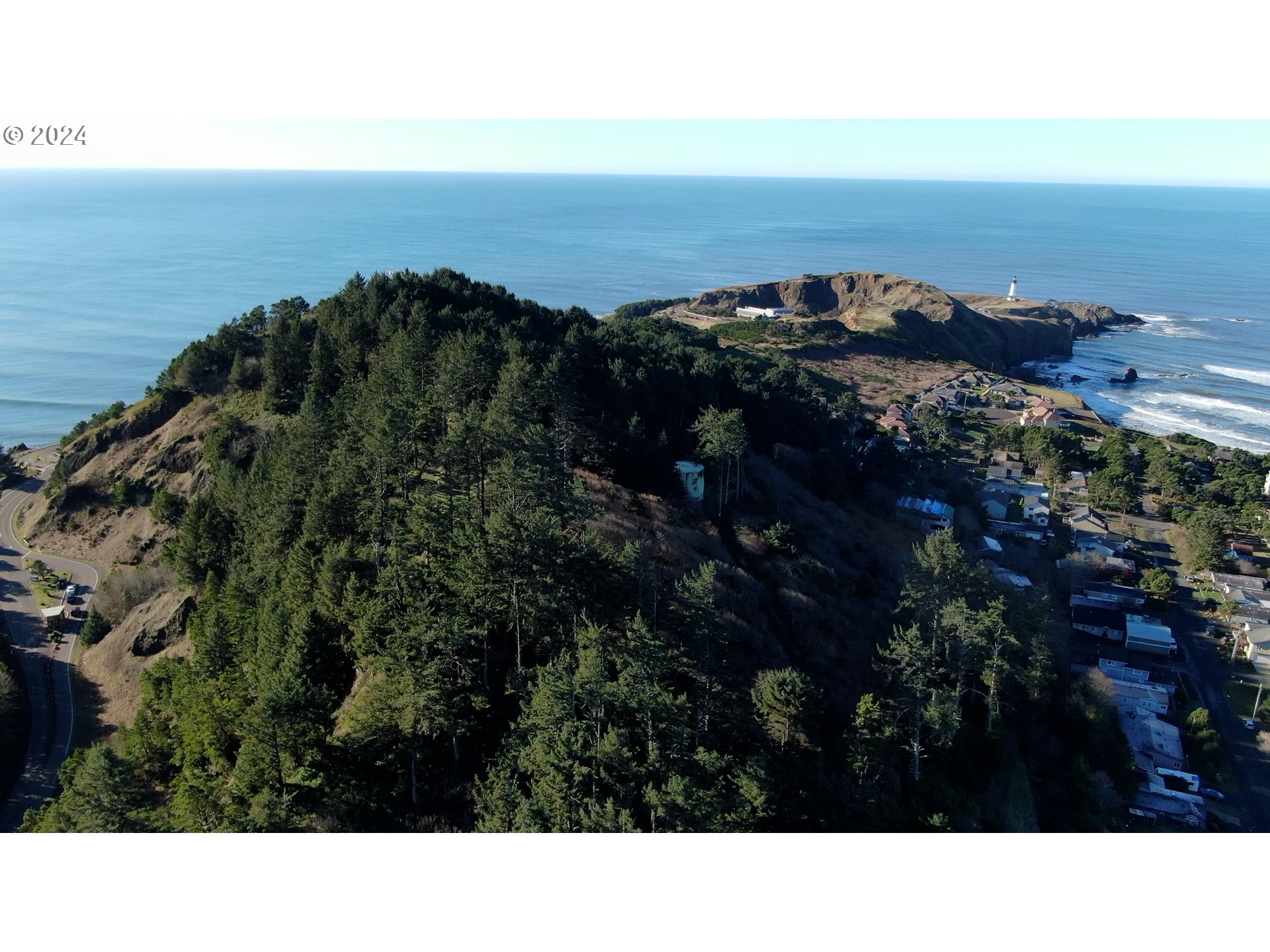 0 Northwest Rhododendron Street, Unit 9 10 11 Newport, OR 97365 - Photo 5 of 6 a black and white view of ocean and city