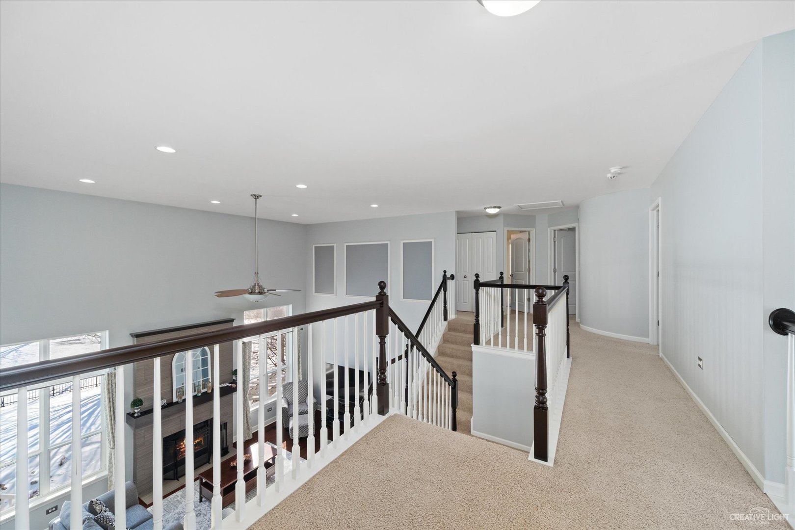 2933 Kelly Drive Elgin, IL 60124 - Photo 25 of 52 a view of staircase with lots of wooden floor and windows