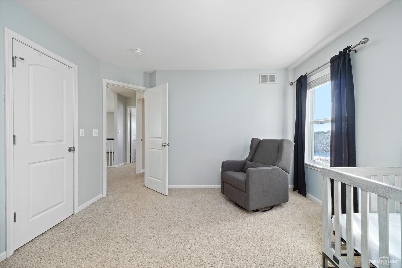 2933 Kelly Drive Elgin, IL 60124 - Photo 34 of 52 a living room with furniture and a window