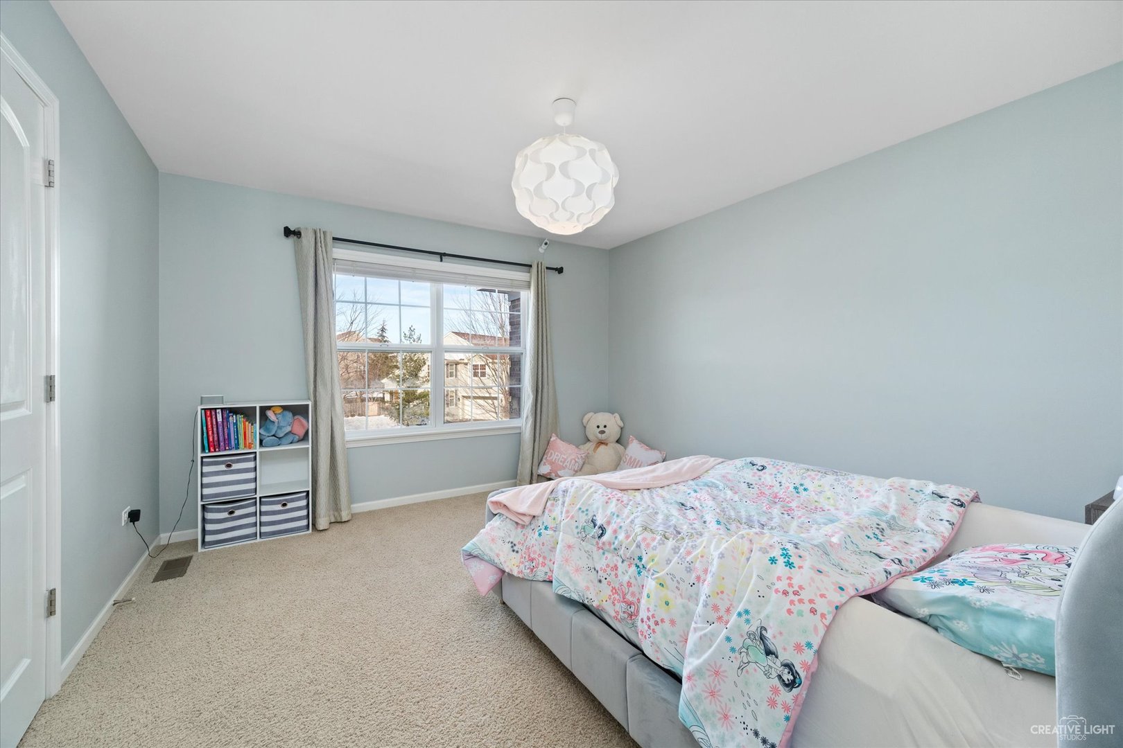 2933 Kelly Drive Elgin, IL 60124 - Photo 35 of 52 a bedroom with a bed and a window