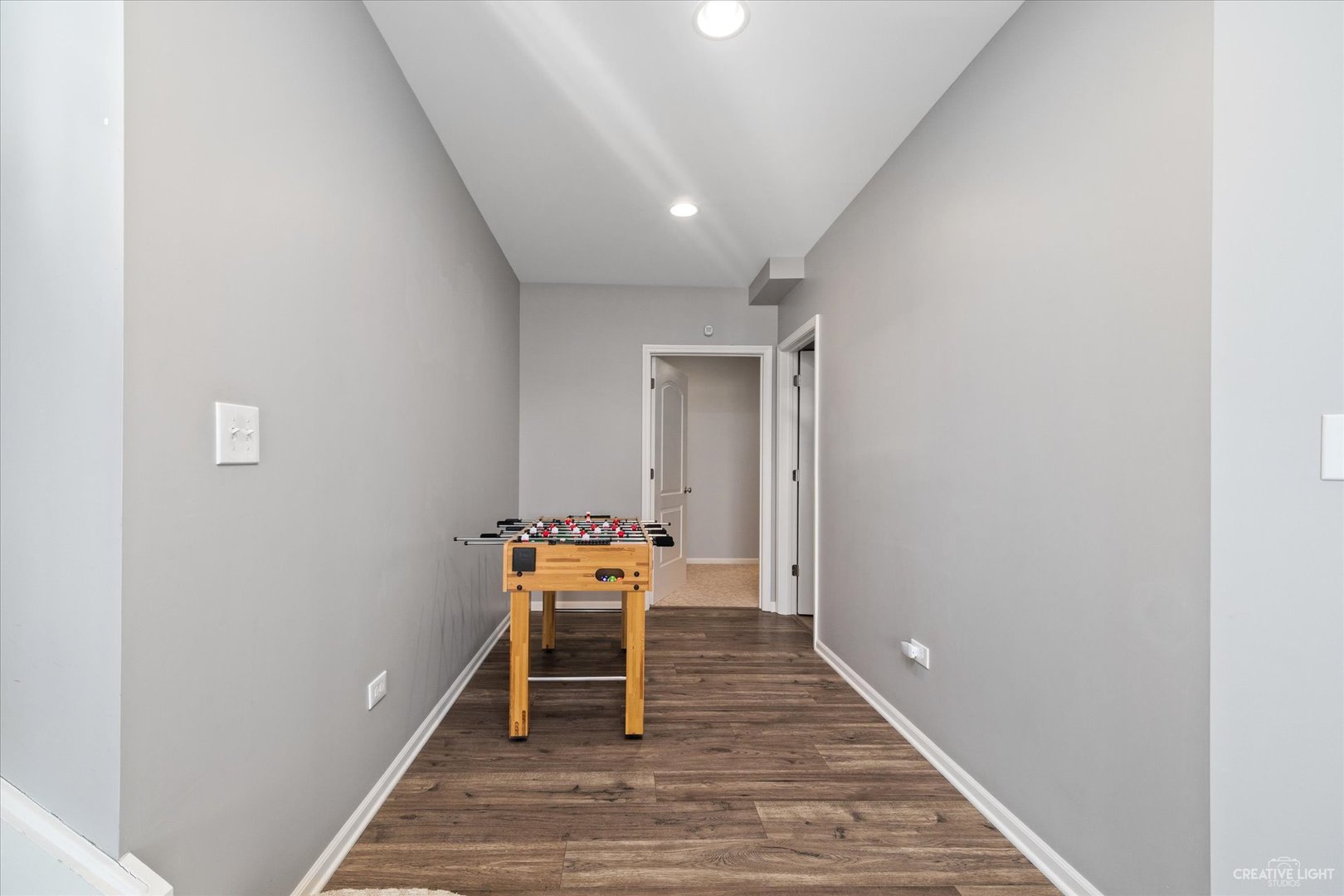 2933 Kelly Drive Elgin, IL 60124 - Photo 37 of 52 a view of a hallway with wooden floor and a hallway