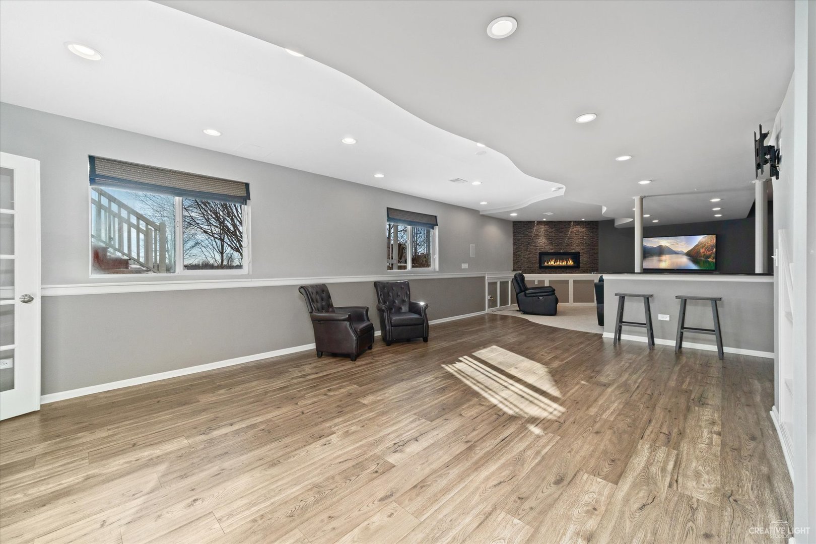2933 Kelly Drive Elgin, IL 60124 - Photo 38 of 52 a living room with stainless steel appliances furniture and wooden floor