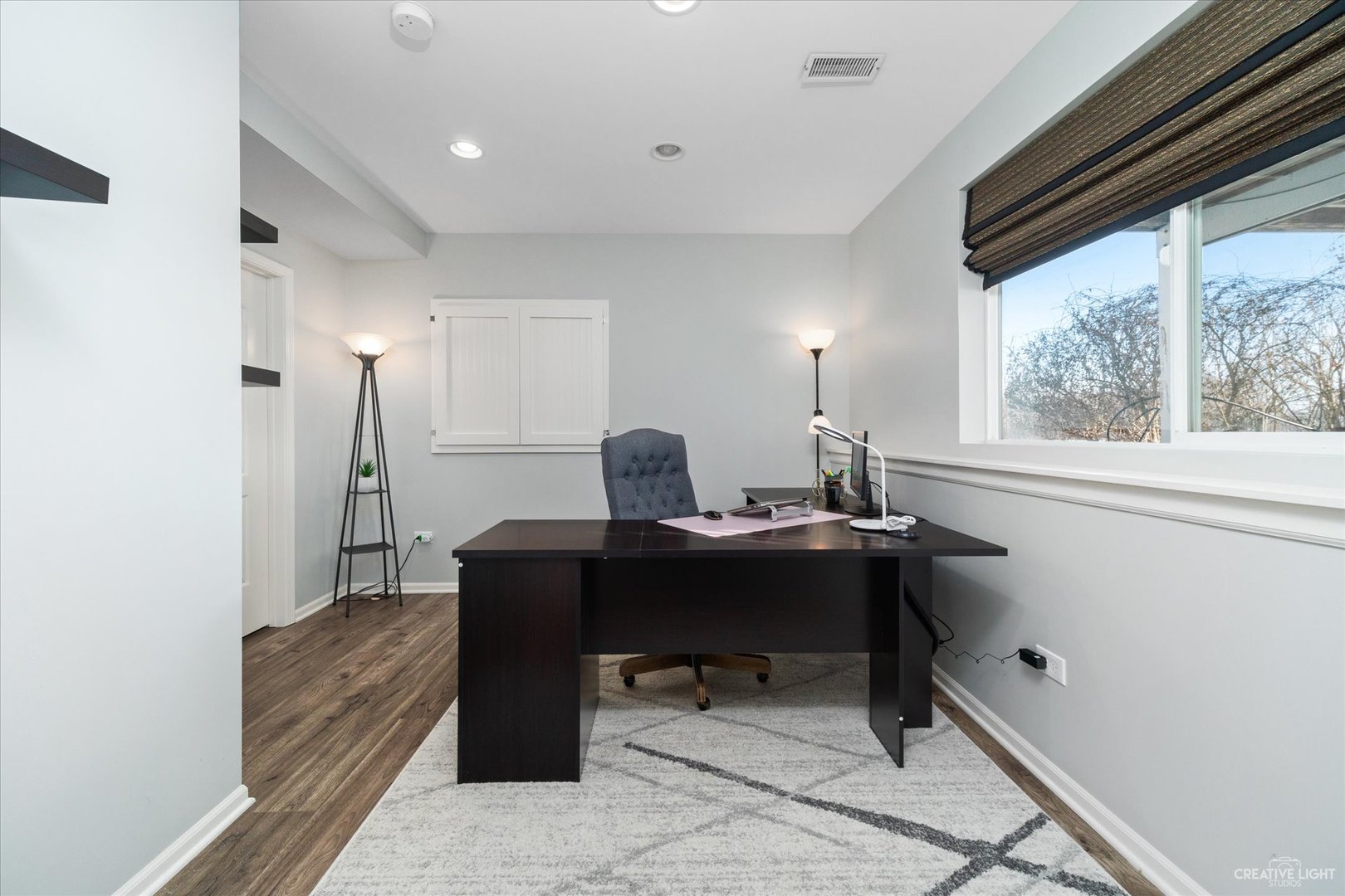 2933 Kelly Drive Elgin, IL 60124 - Photo 43 of 52 a view of a workspace with furniture and a window