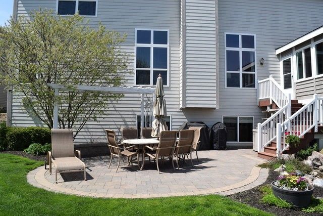 2933 Kelly Drive Elgin, IL 60124 - Photo 49 of 52 a view of a house with backyard sitting area and garden