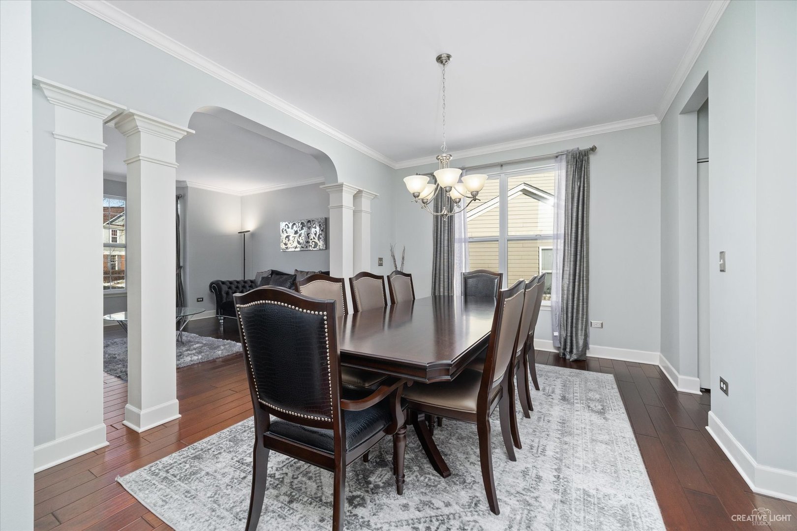 2933 Kelly Drive Elgin, IL 60124 - Photo 9 of 52 a view of a dining room with furniture window and wooden floor