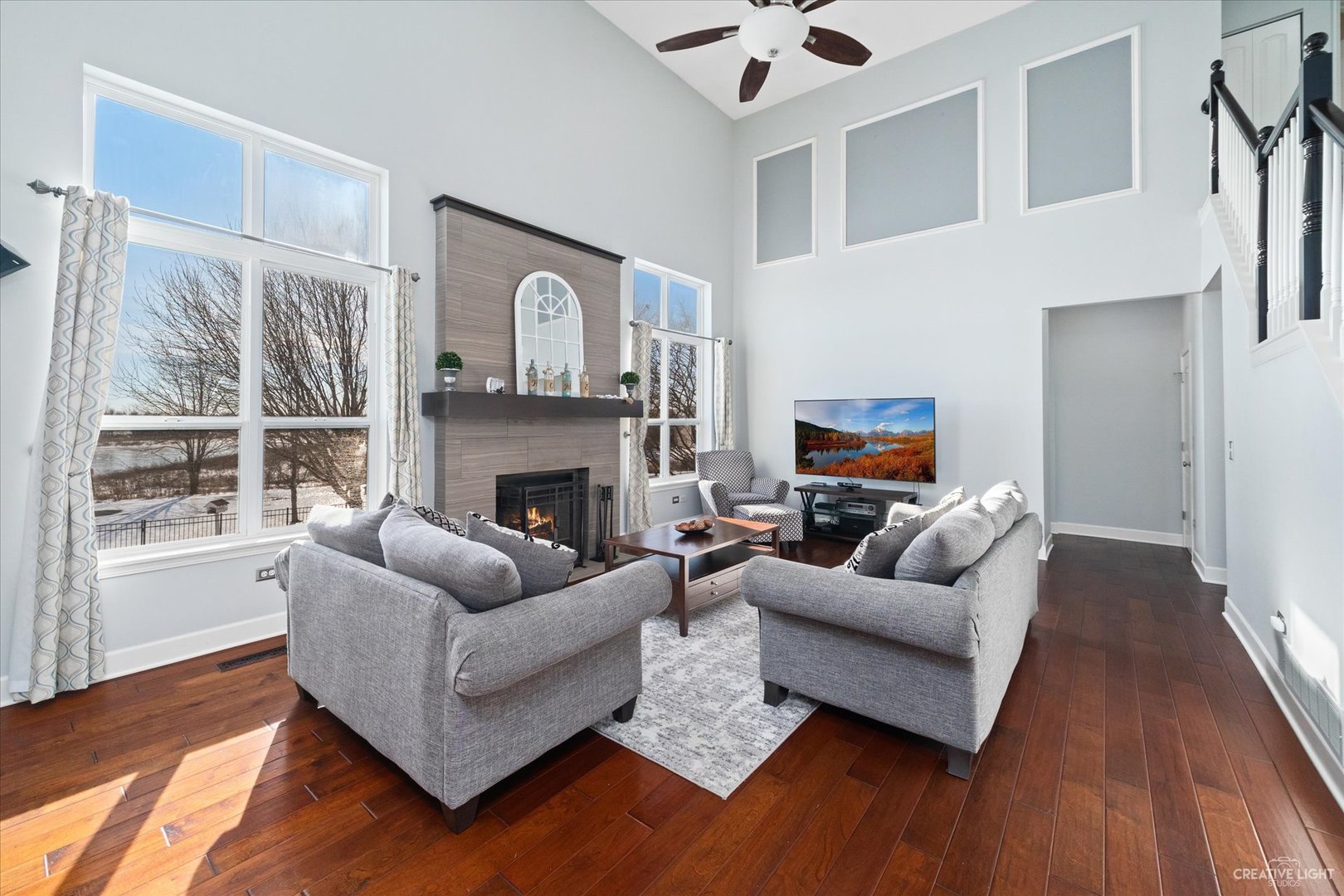 2933 Kelly Drive Elgin, IL 60124 - Photo 10 of 52 a living room with furniture flat screen tv and a fireplace