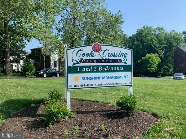 a sign on the side of the road